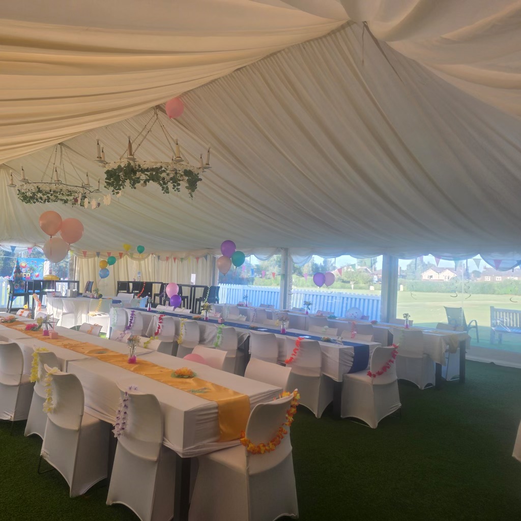 Colourful Table Set Up In Outdoor Marquee