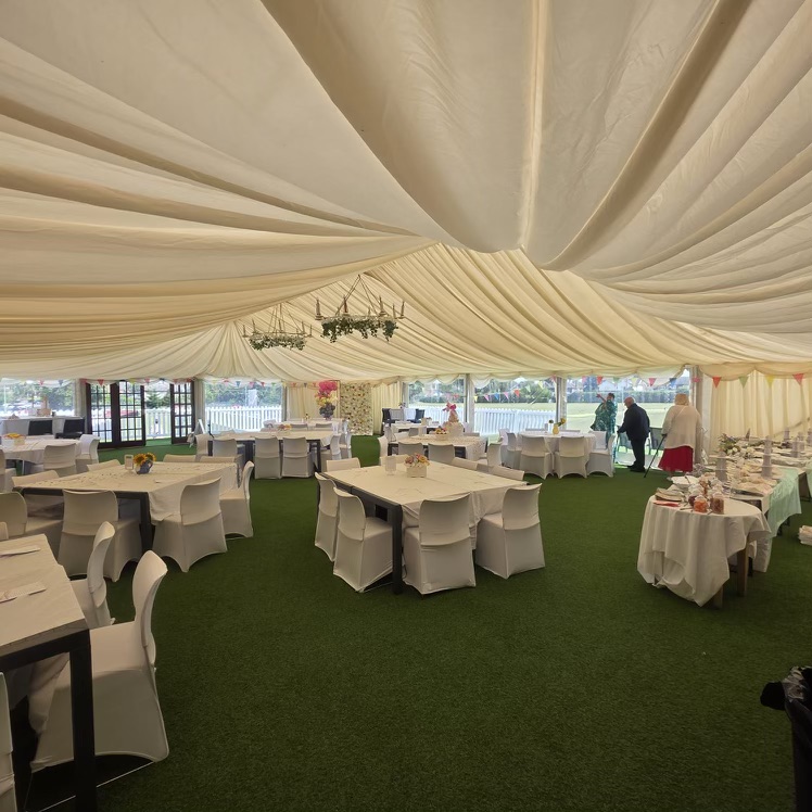 White Tables In Outdoor Marquee For Baby Shower 4